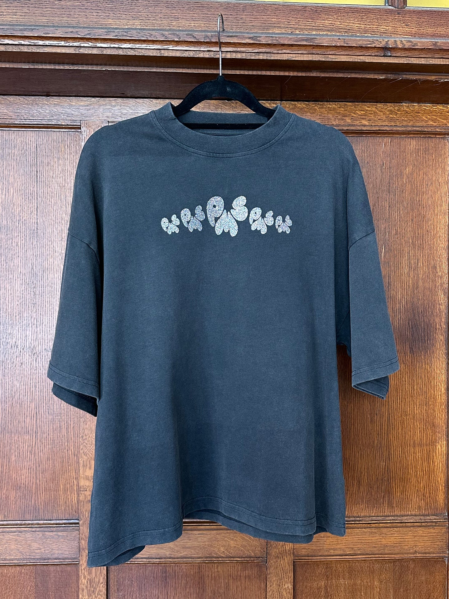 CONFETTI SILVER FRONT & BLACK GLITTER BACK SPARKLES ON WASHED BLACK T-SHIRT (SIZE XS OVERSIZED BOXY FIT)